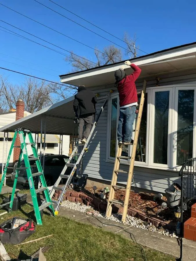 Restoration crew performing exterior repair in Barling
